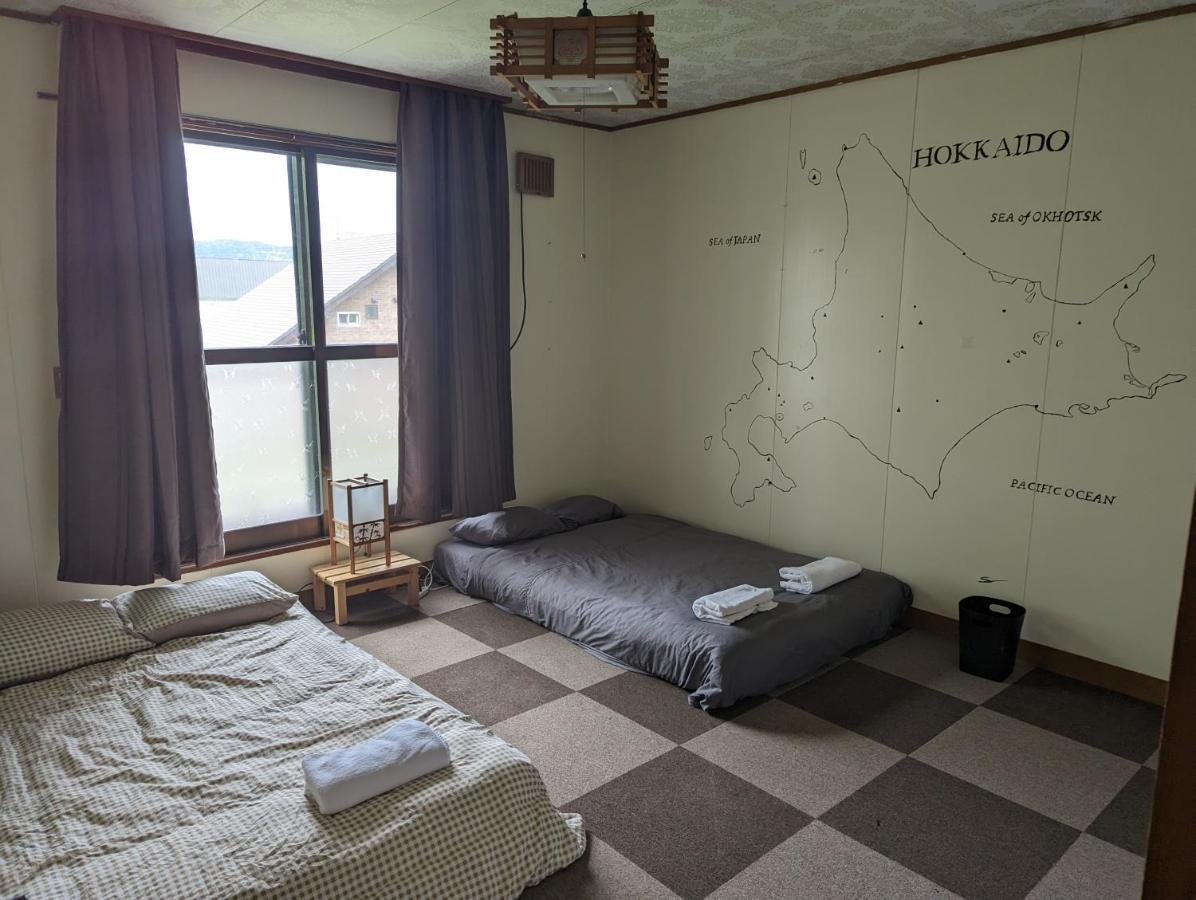 Хостел Yukiumi House Камікава Номер фото