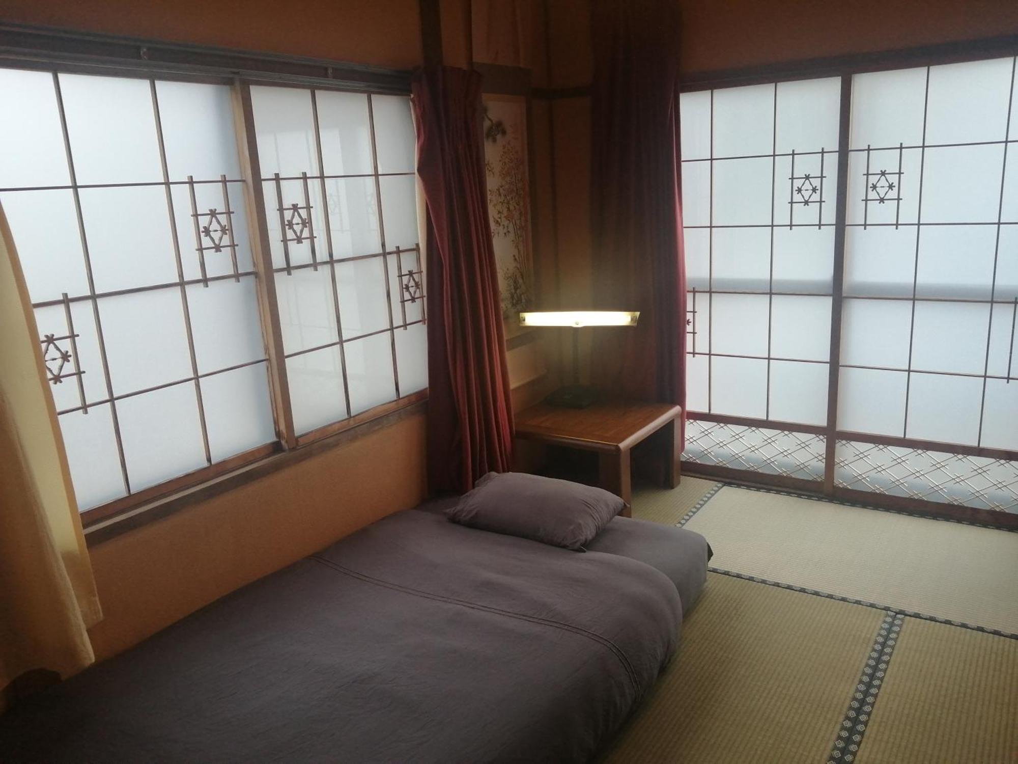 Хостел Yukiumi House Камікава Номер фото